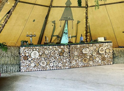 A bar in a teepee tent.